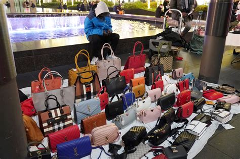 is it illegal to buy fake designer bags from china|copy bags from china illegal.